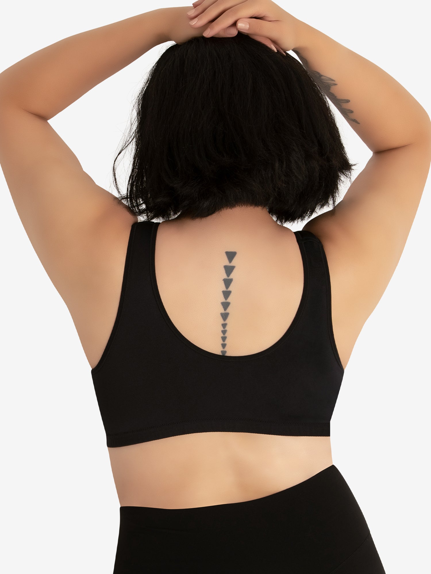 Back view of seamless crossover comfort bra in black onyx