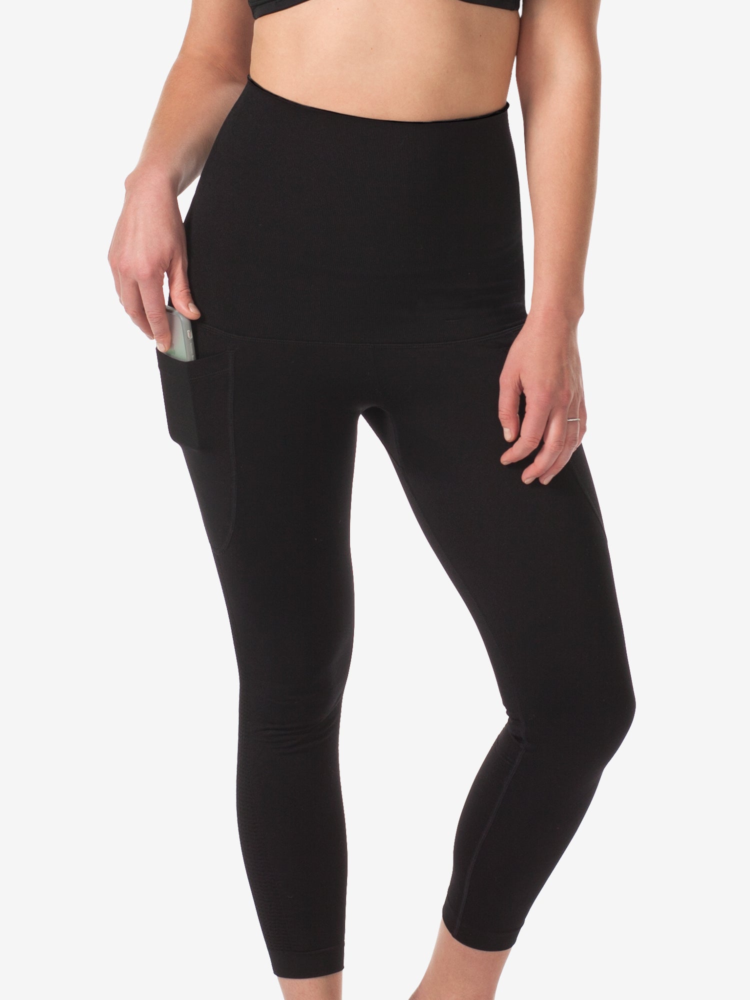 Back view of control high-waist legging in jet black with heather grey space dye