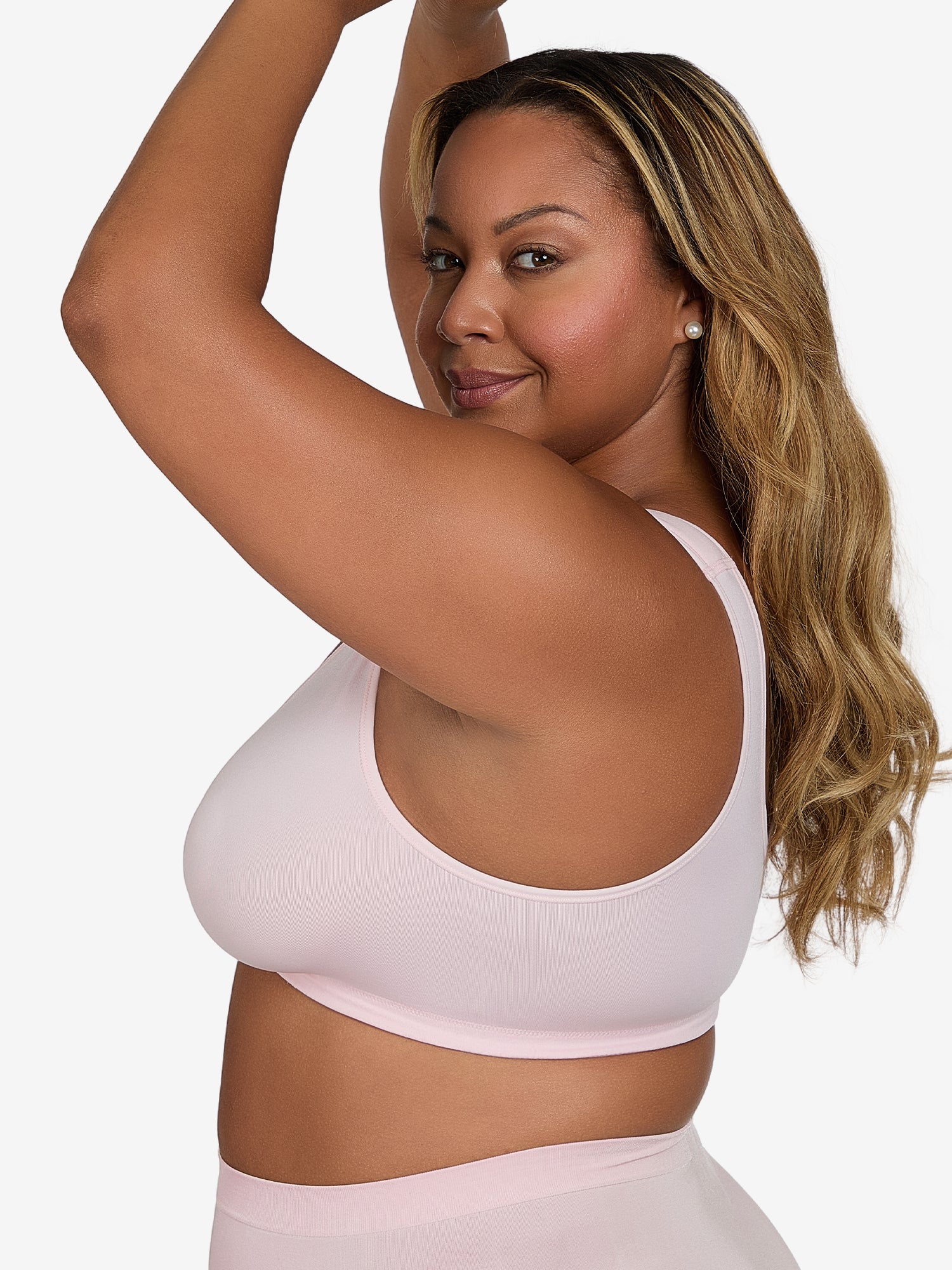 Side view of front-closure seamless comfort bra in pink crush