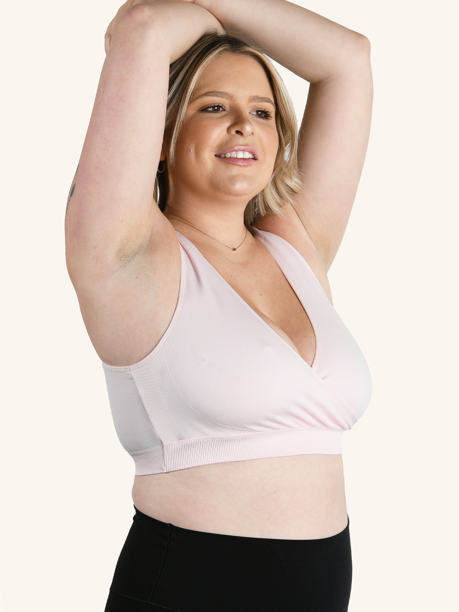 Side view of nylon seamless sleep bra in blush