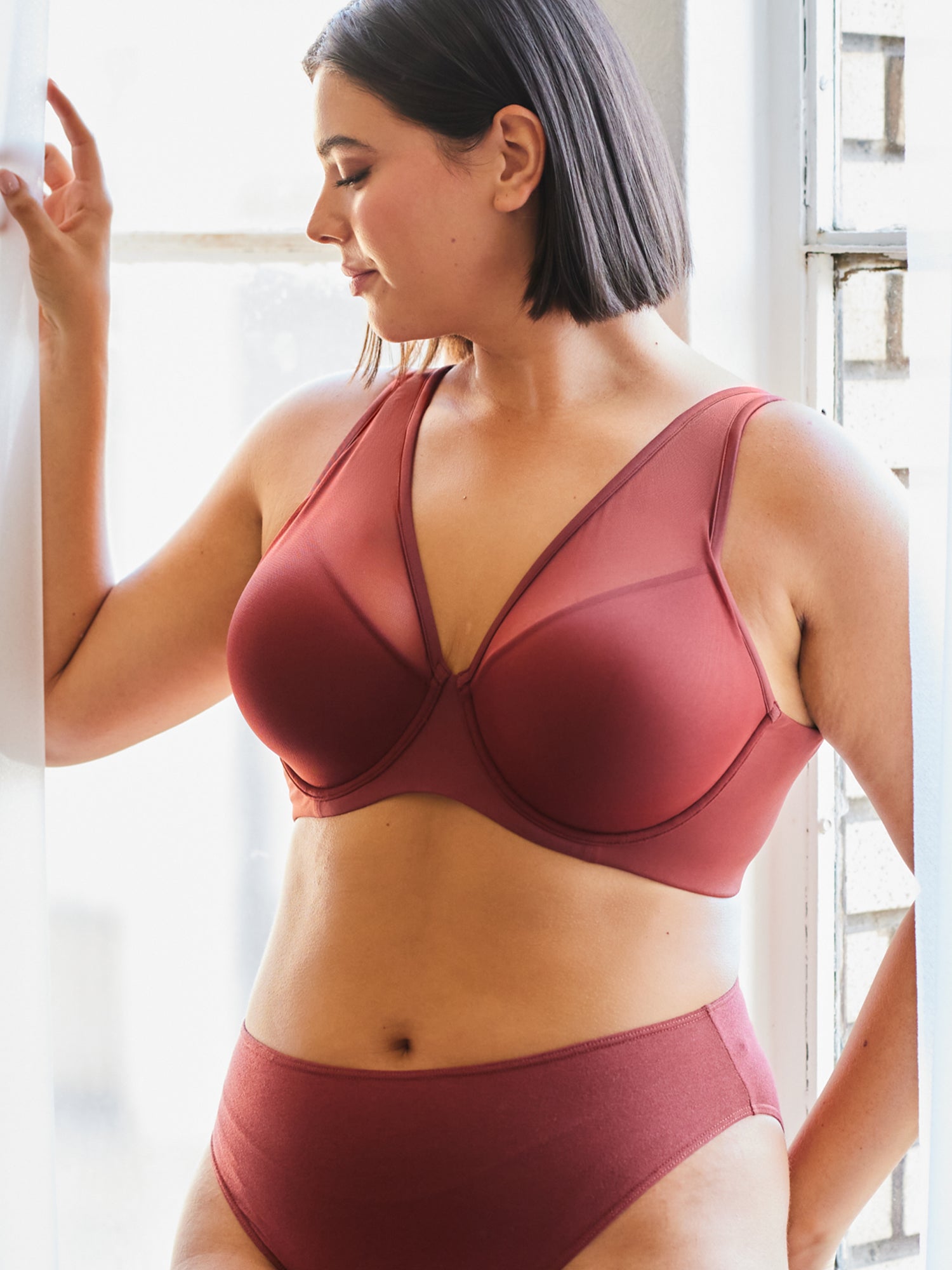 Lifestyle view of mesh plunge underwire bra in spiced apple