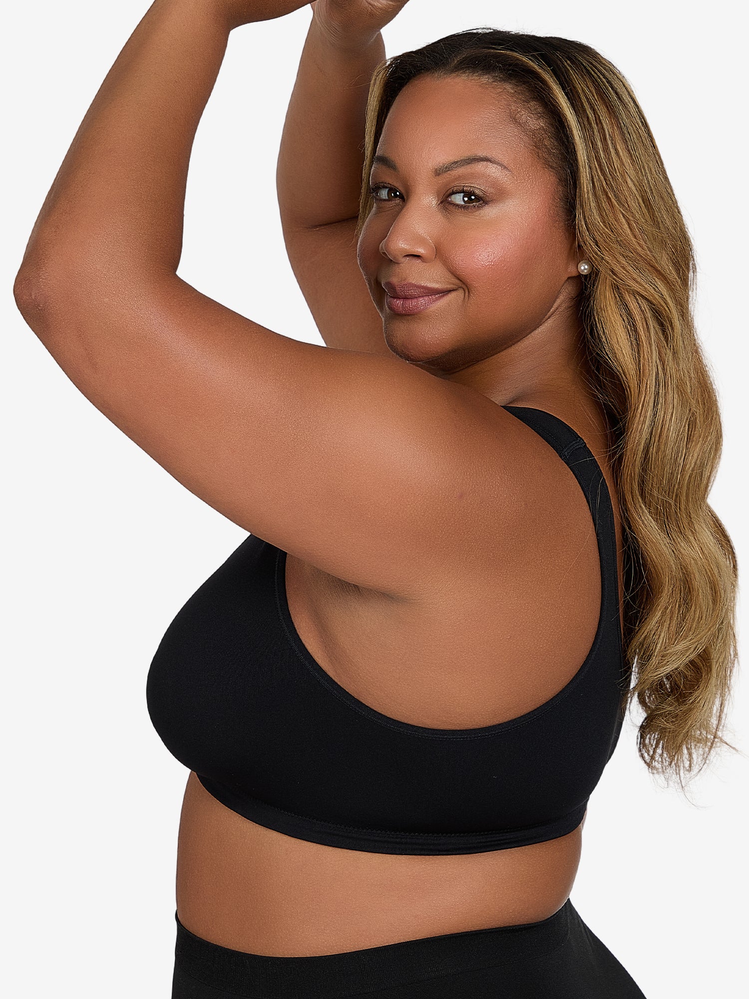 Side view of front-closure seamless comfort bra in black onyx