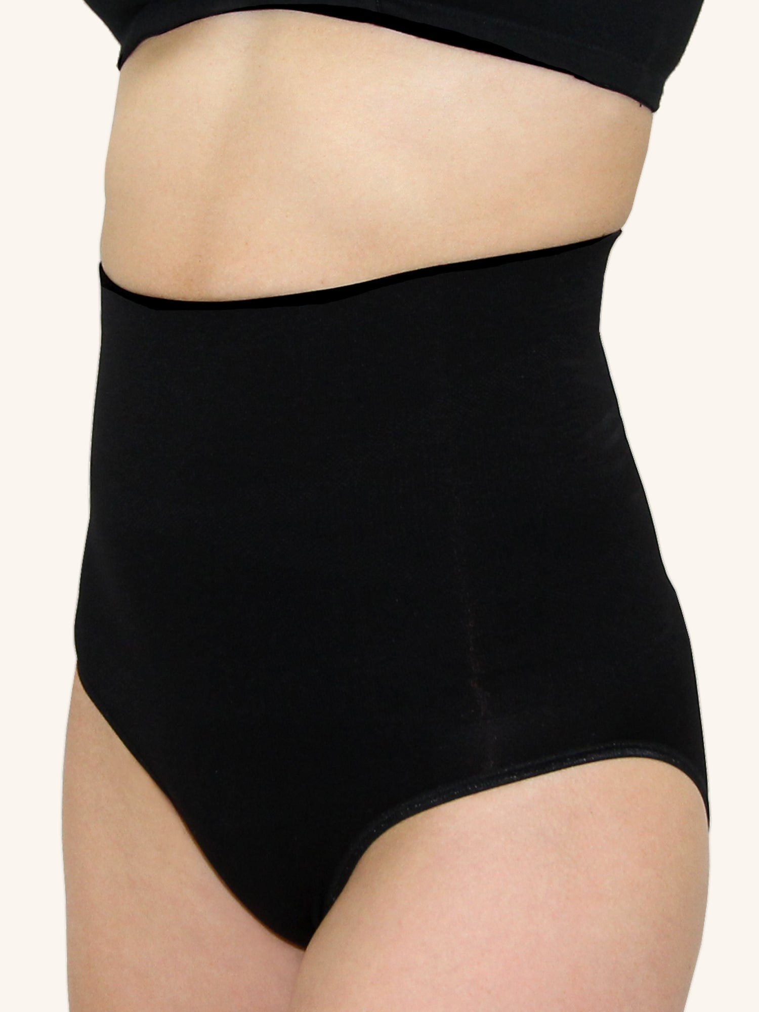 Front view of postpartum shapewear brief in jet black