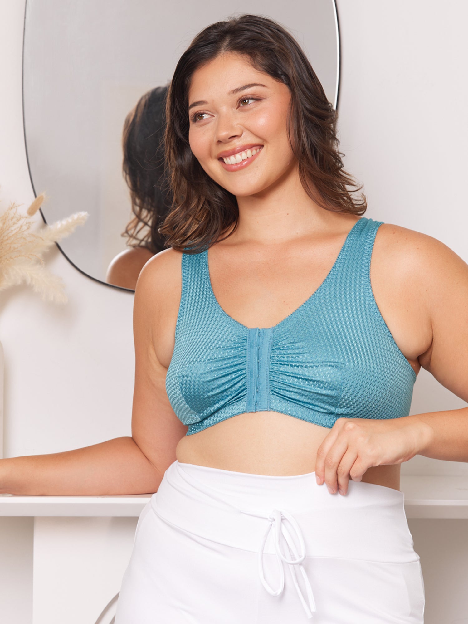 Front lifestyle view of zig-zag weave front-closure comfort bra in blue