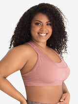 Back view of seamless medium impact sports bra in whisky rose