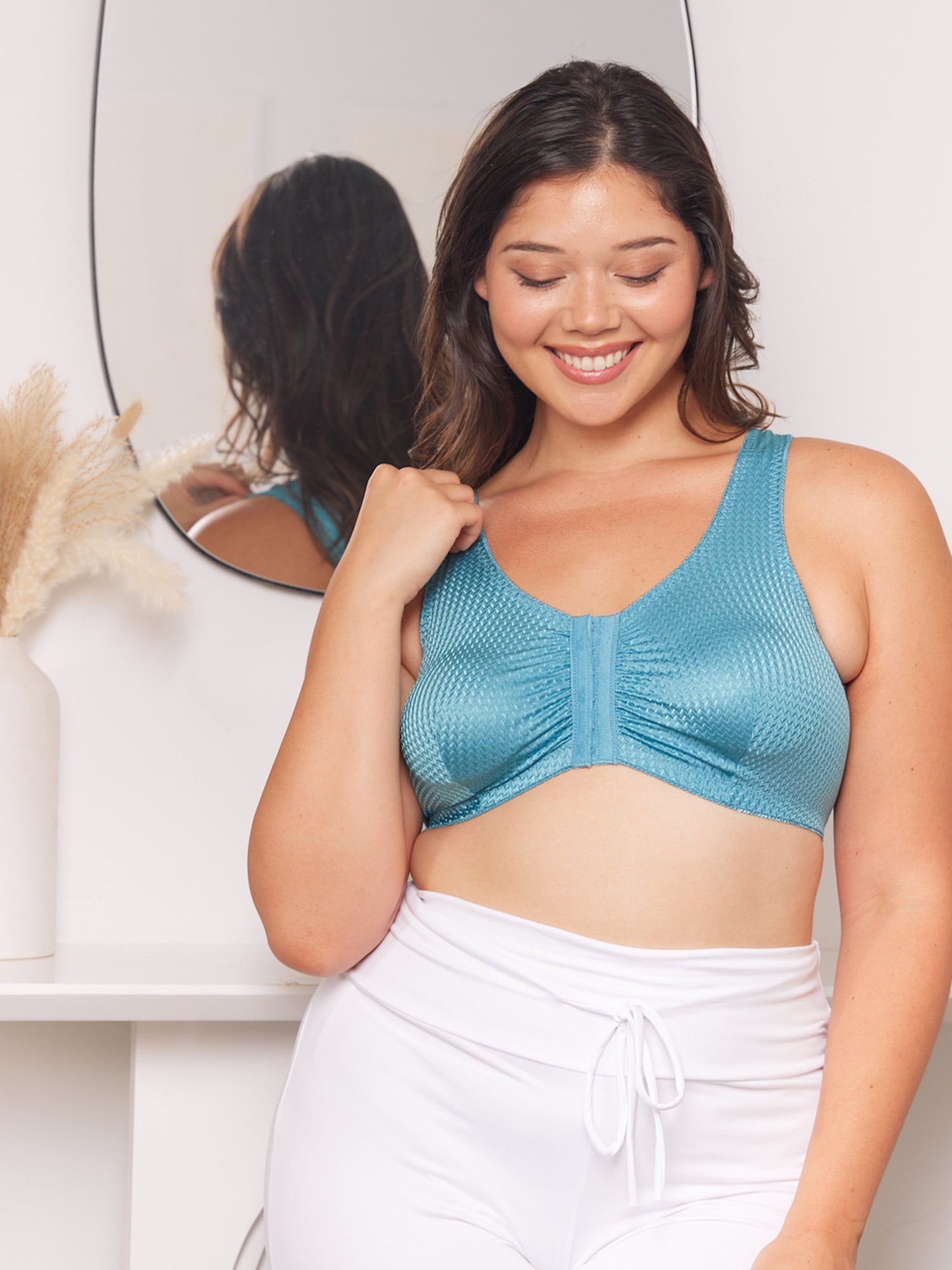 Front lifestyle view of zig-zag weave front-closure comfort bra in blue