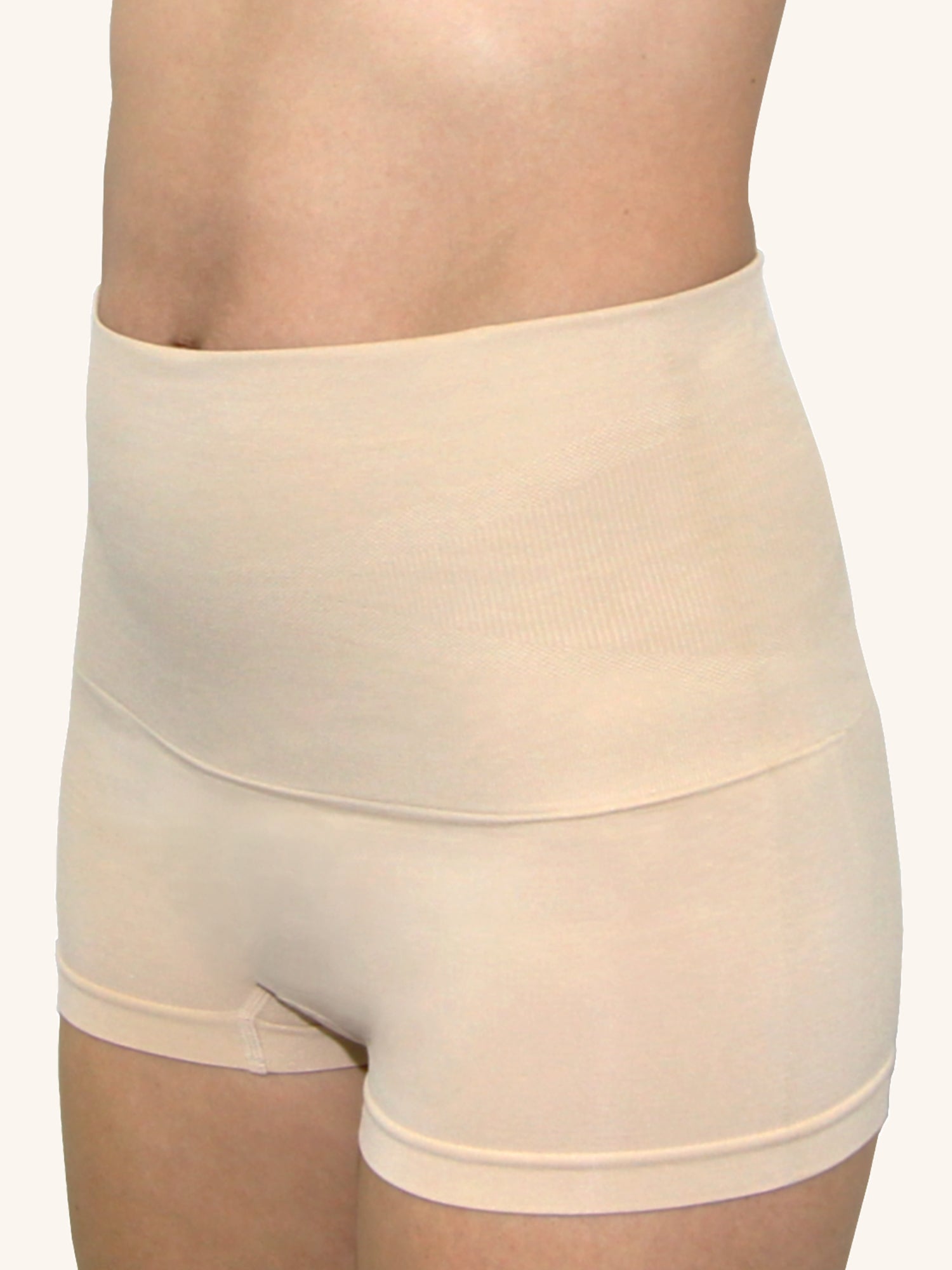 Front view of in postpartum shapewear boyshort with firm tummy control naturally nude