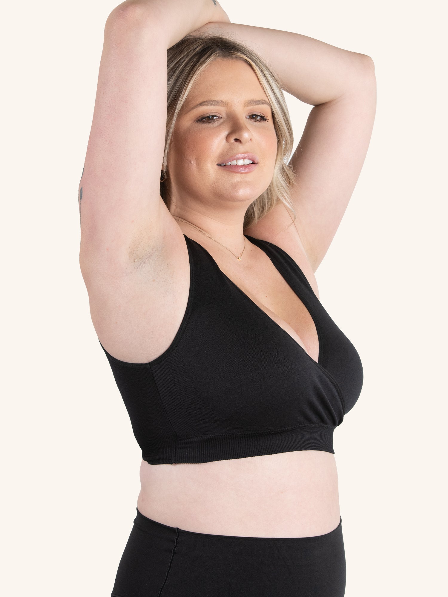 Side view of nylon seamless sleep bra in jet black