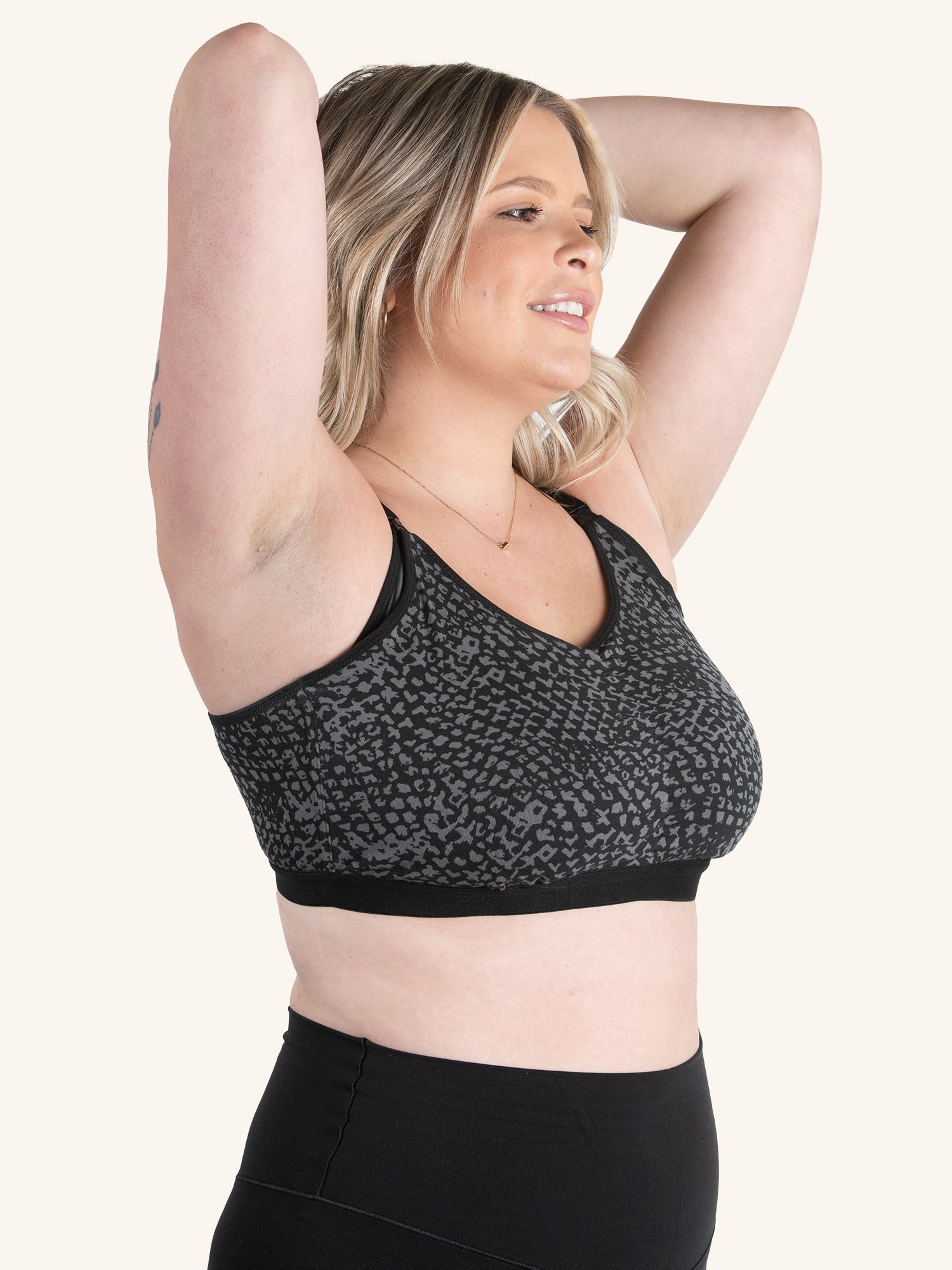 Side view of front comfort nursing bra in black and dark grey print