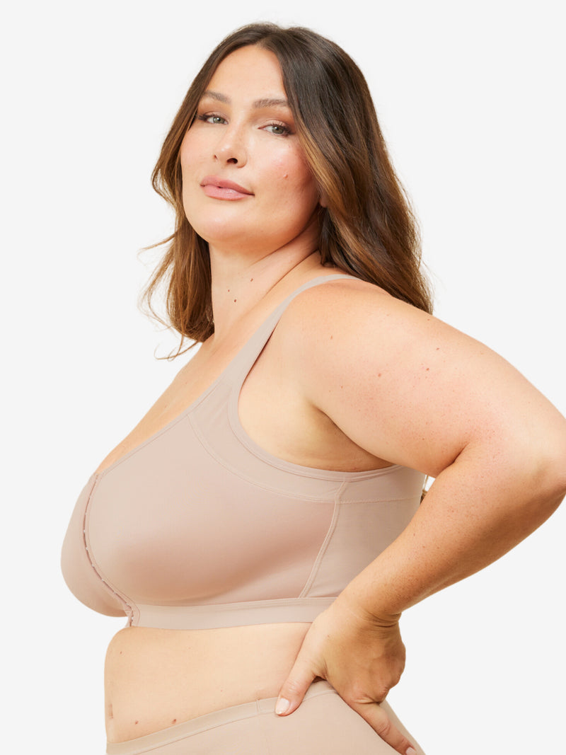 Side view of posture support smoothing front-closure bra in sand