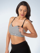 Front view of loving moments nursing sports bra in black and white stripe