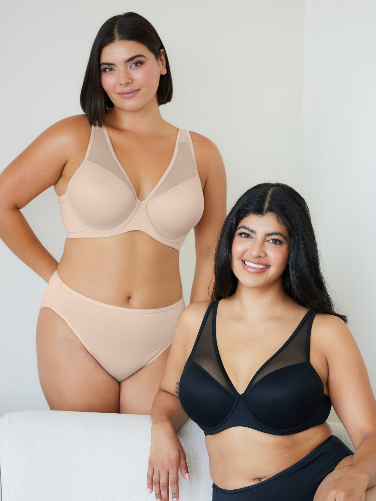 Lifestyle view of mesh plunge underwire bra in black