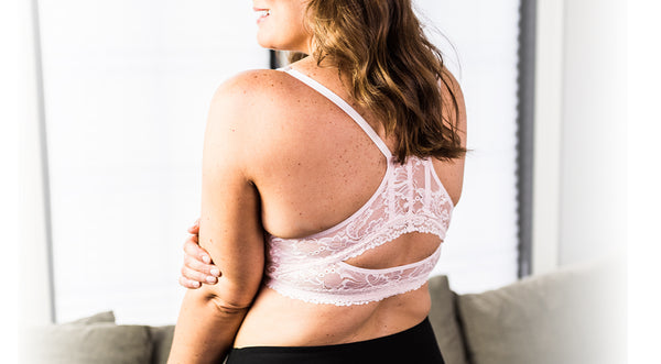 Woman's back showing back of a racerback bra