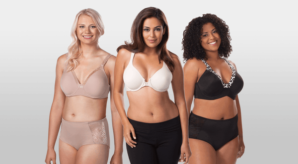 Three women standing next to each other in bras and underwear