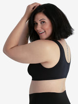Side view of front-closure seamless comfort bra in black onyx