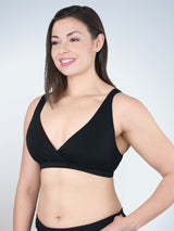 Front view of crossover sleep bra in black