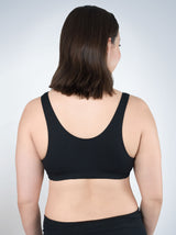 Back view of crossover sleep bra in black