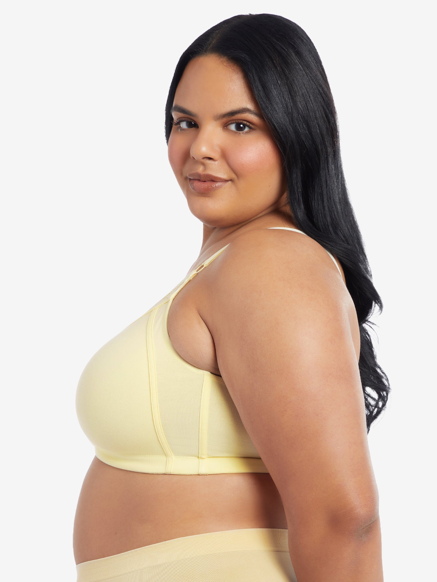 Side view of wireless cotton comfort bra with lace in light yellow ecru