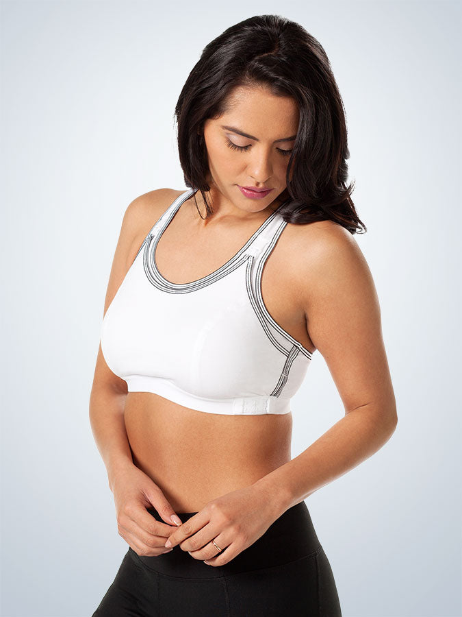 Side view of maternity to nursing adjustable sports bra in white