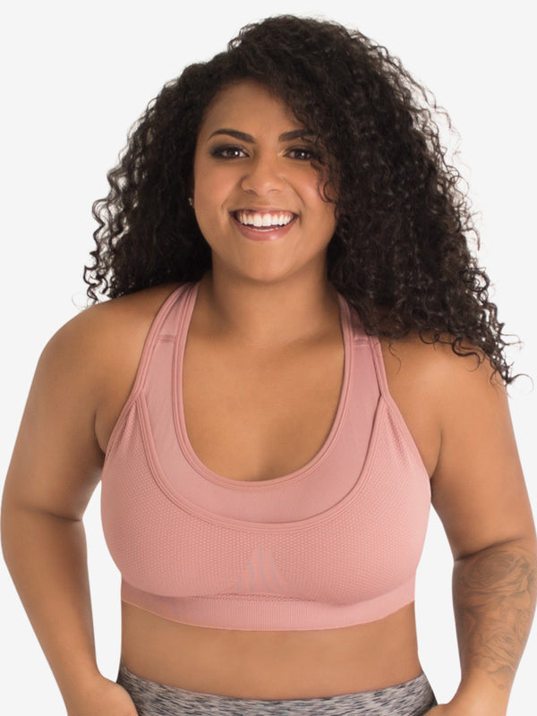 Front view of seamless medium impact sports bra in whisky rose