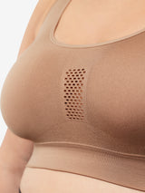 Close up detail view of cooling everyday sports bra in truffle