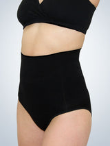 Front view of postpartum shapewear brief in jet black