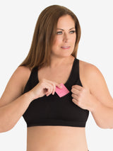 Front view of seamless medium impact sports bra in jet black