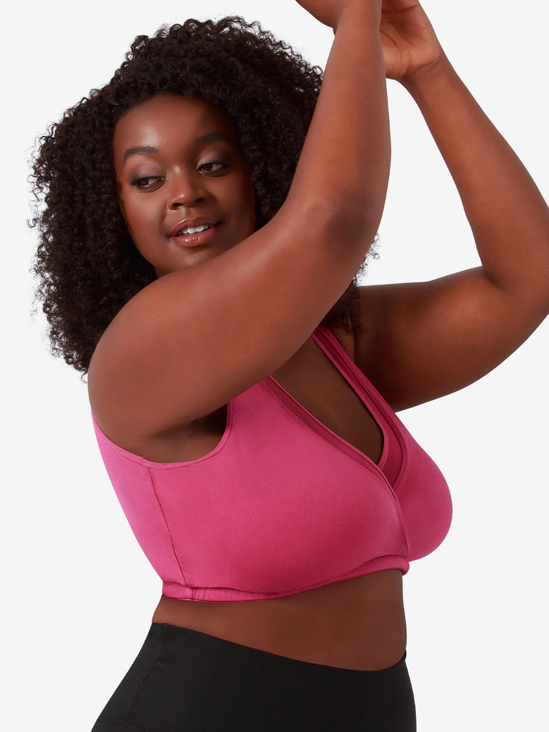 Side view of seamless crossover comfort bra in magenta haze