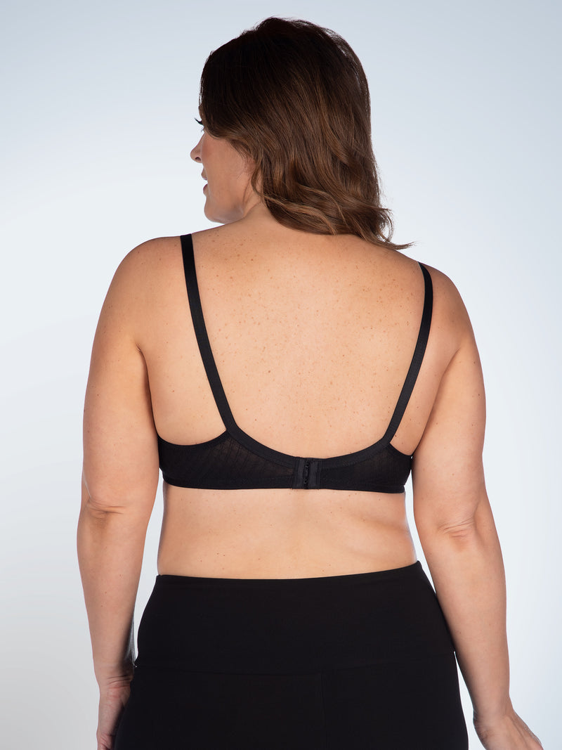 Back view of loving moments underwire lace nursing bra in black check lace over warm taupe