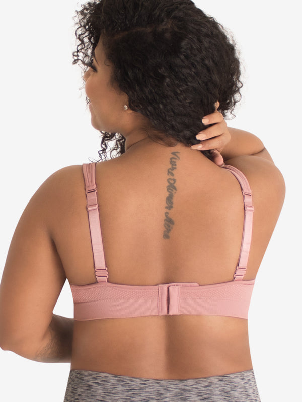 Front view of seamless medium impact sports bra in whisky rose