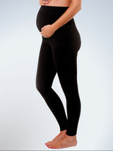 Side view of maternity support leggings patented back support in black