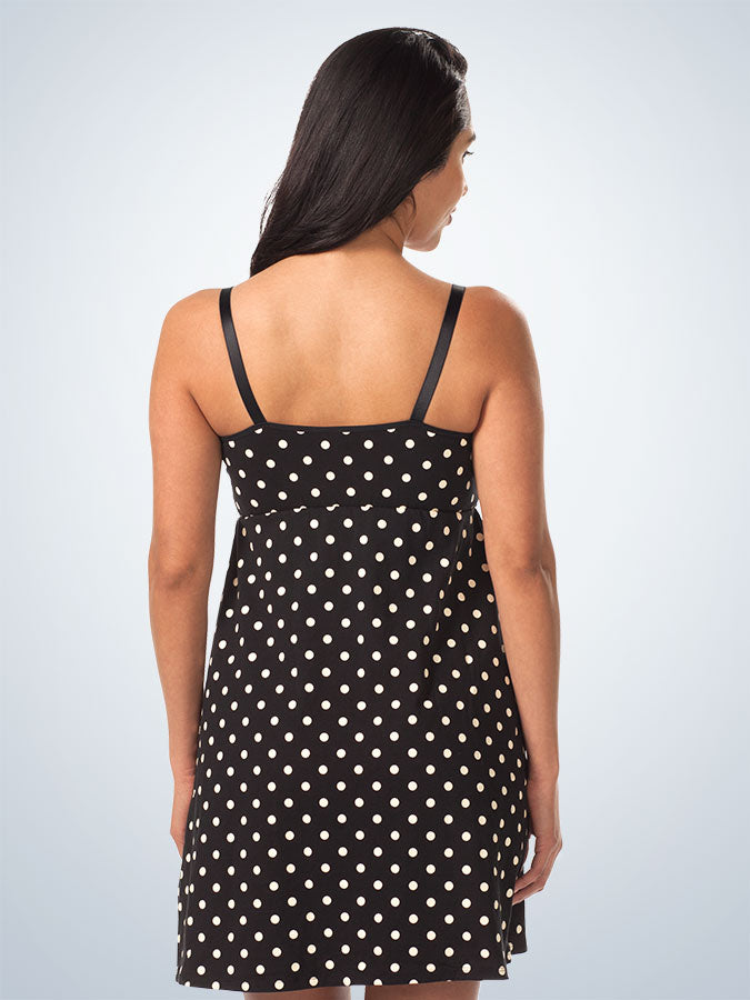 Back view of shirred-front comfort maternity and nursing tank dress in black and white dot