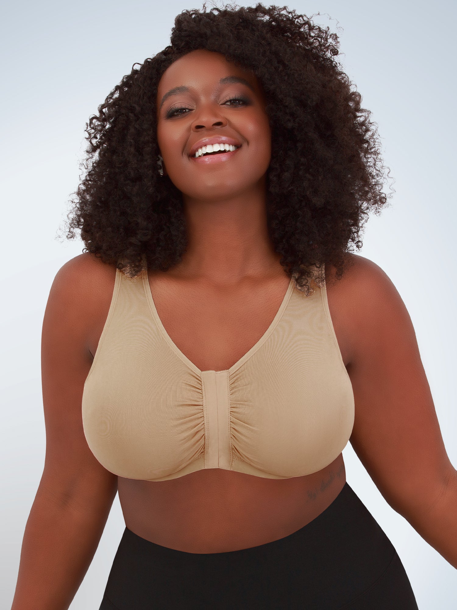 Front view of seamless comfort front-closure bra in salt beige